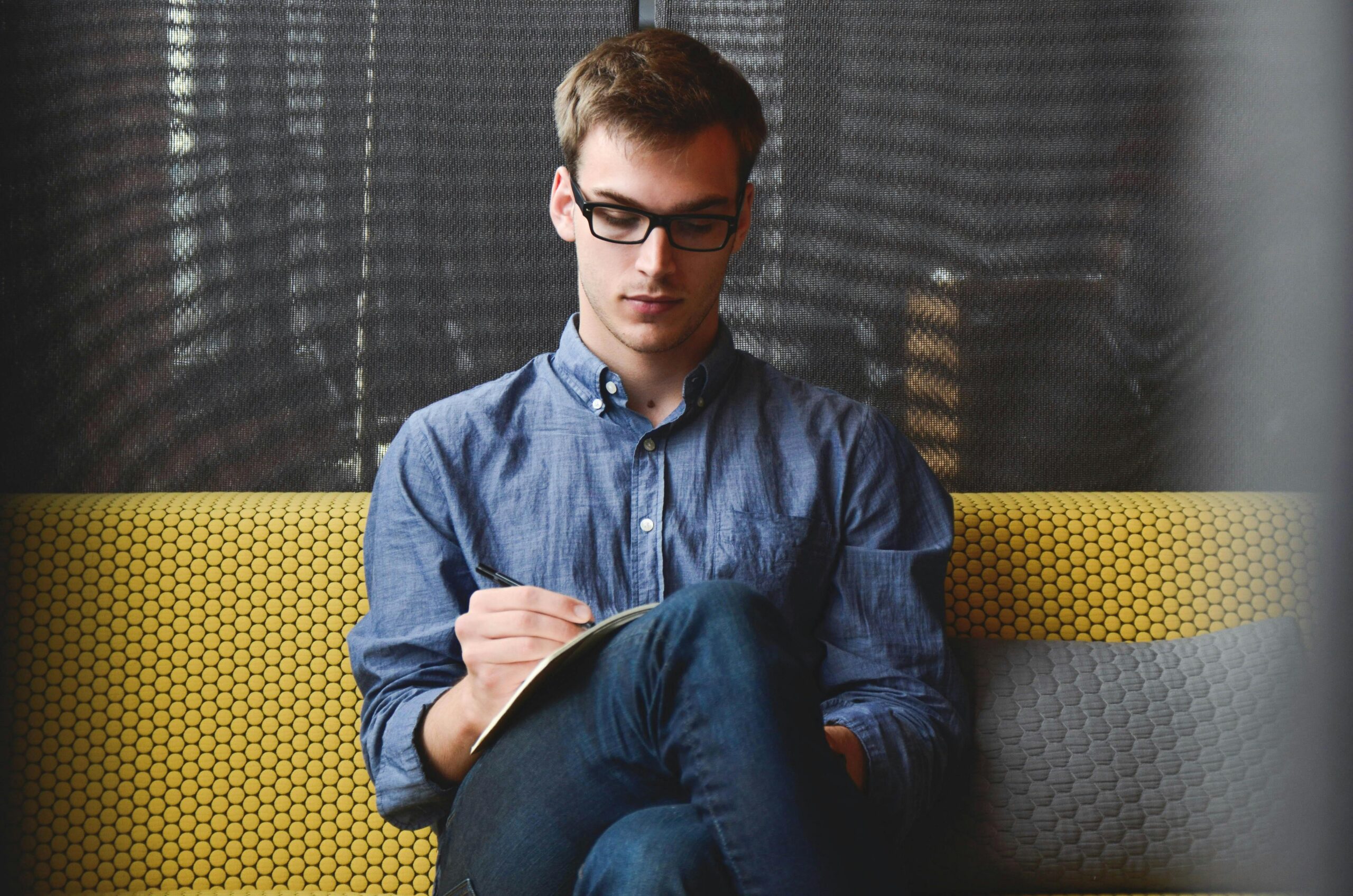 A young man in writing