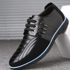 Black casual lace-up shoes with a smooth finish and decorative stitching details.