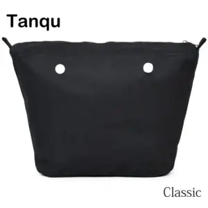 Black canvas tote bag with two circular holes and a zipper closure.